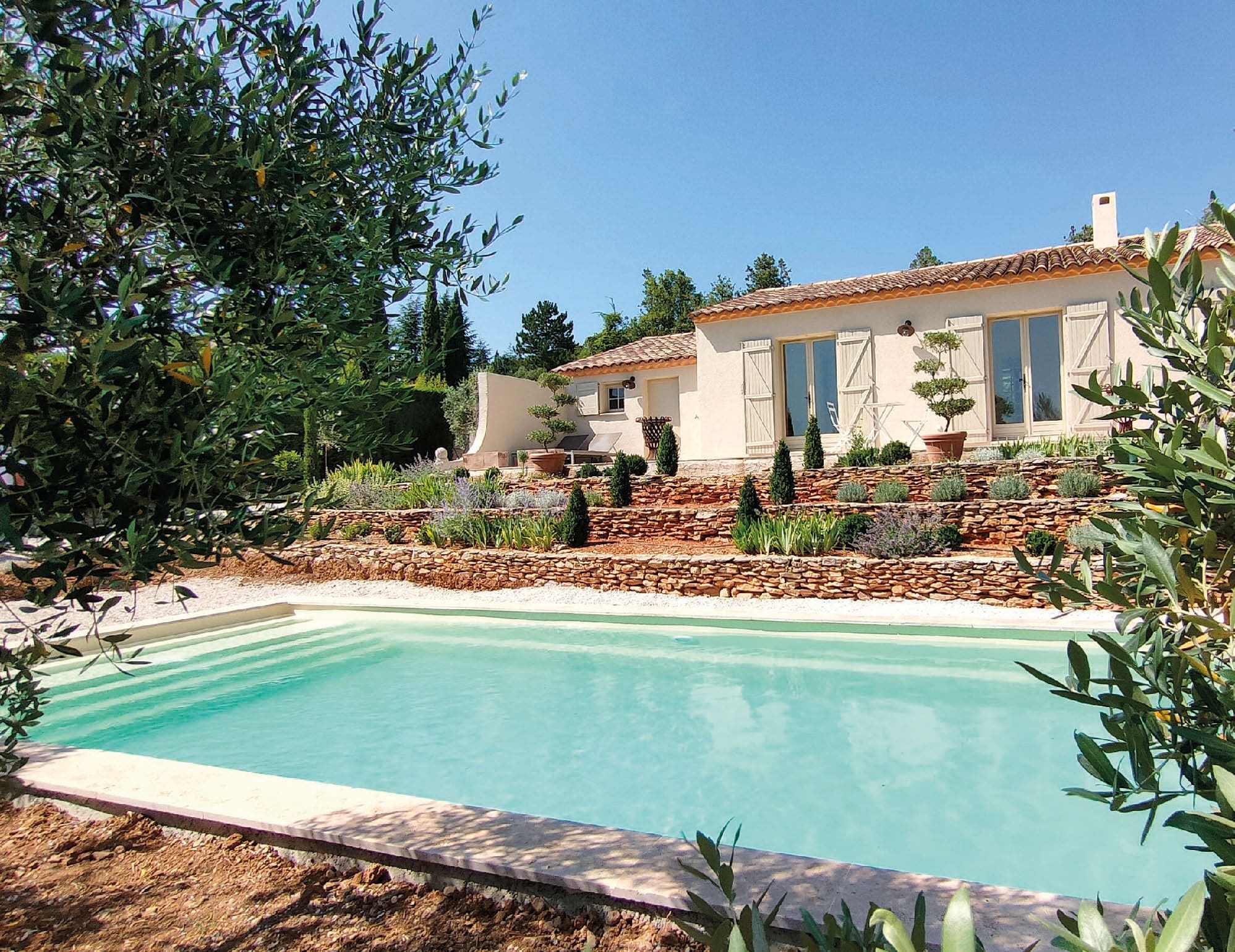 Orlando fibreglass swimming pool installed in a landscaped garden