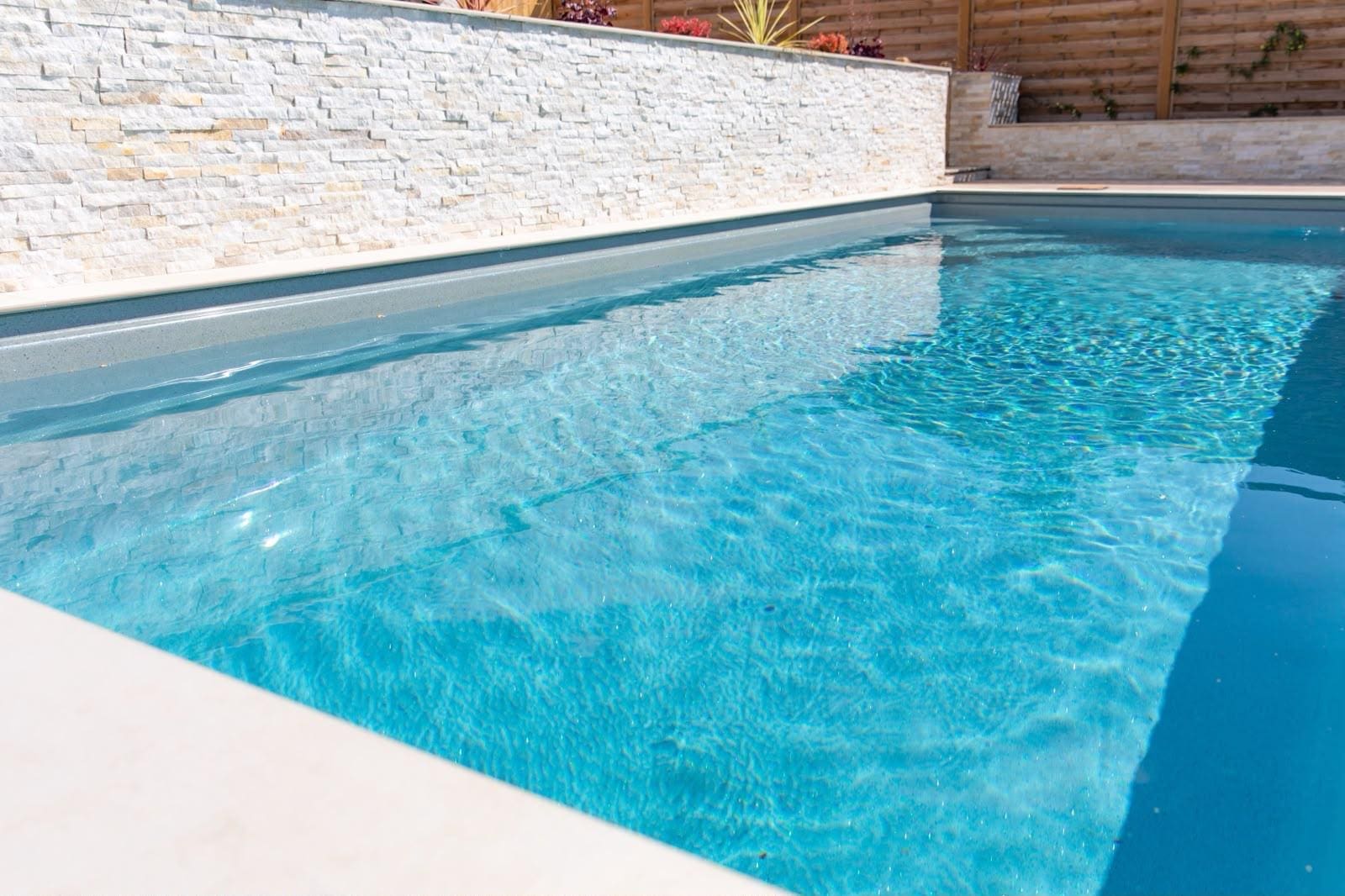 Wide view across the finished Sycillia pool area