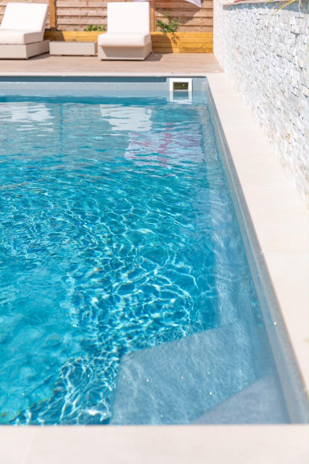 Completed grey Sycillia pool and surrounding garden
