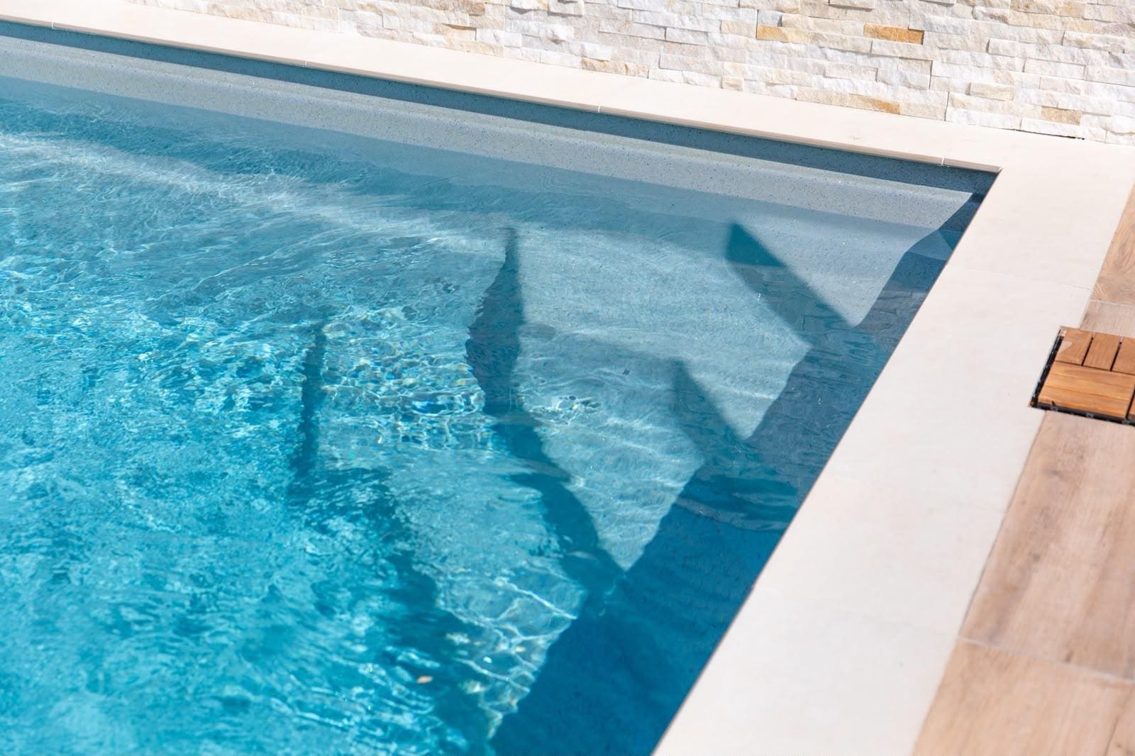 Contemporary Sycillia pool in its finished garden setting