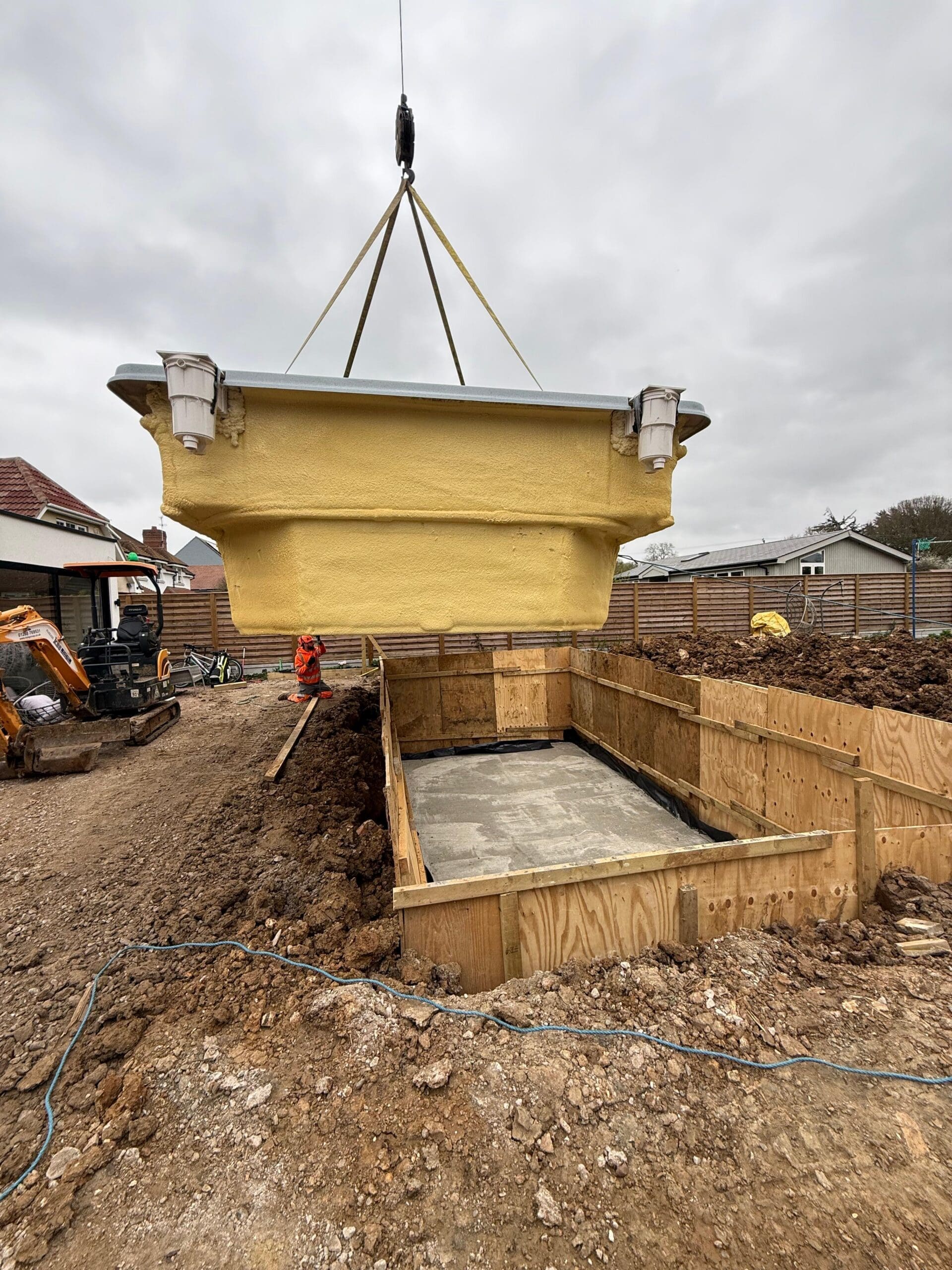 Sycillia pool shell being moved into position