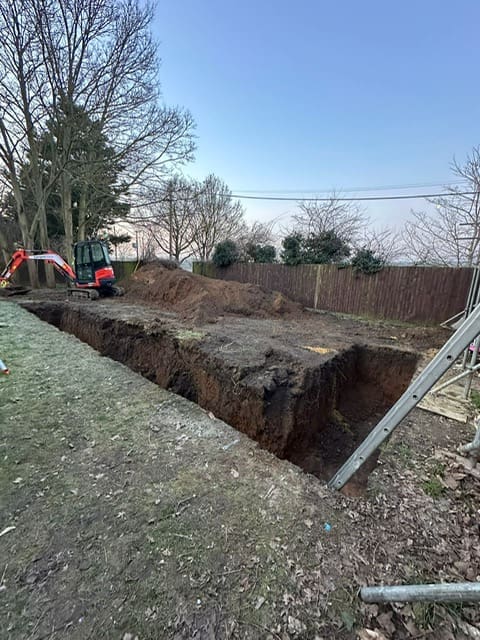 Sloping bottom pool backfilling